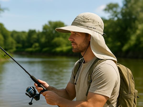 Man fishing by river wearing TOP-EX sun hat with neck flap, lightweight breathable outdoor design.