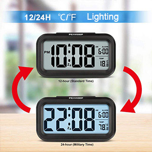 Two digital clocks with large LCD displays showing different times. Red arrows indicate they can be flipped. Text above reads '12/24H °C/°F Lighting'.