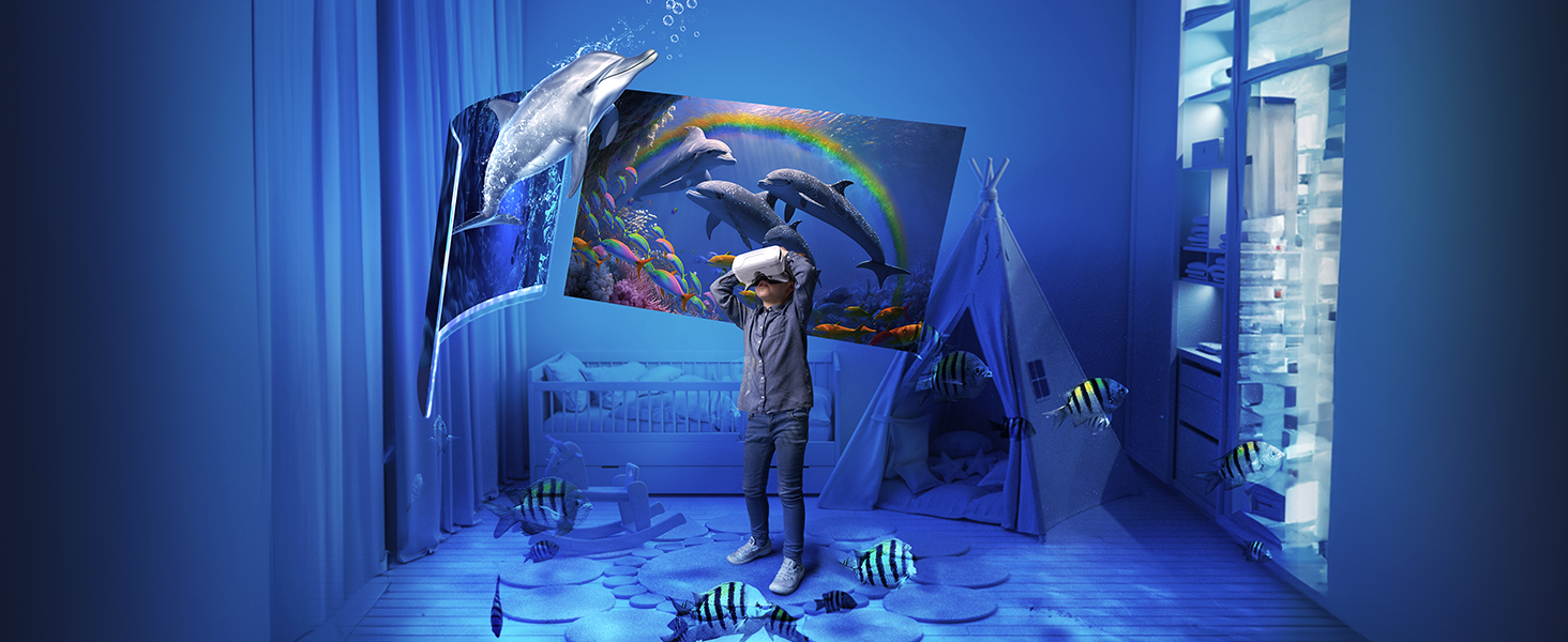 Blue-tinted room with person standing, surrounded by underwater-themed decorations including fish and dolphin images.