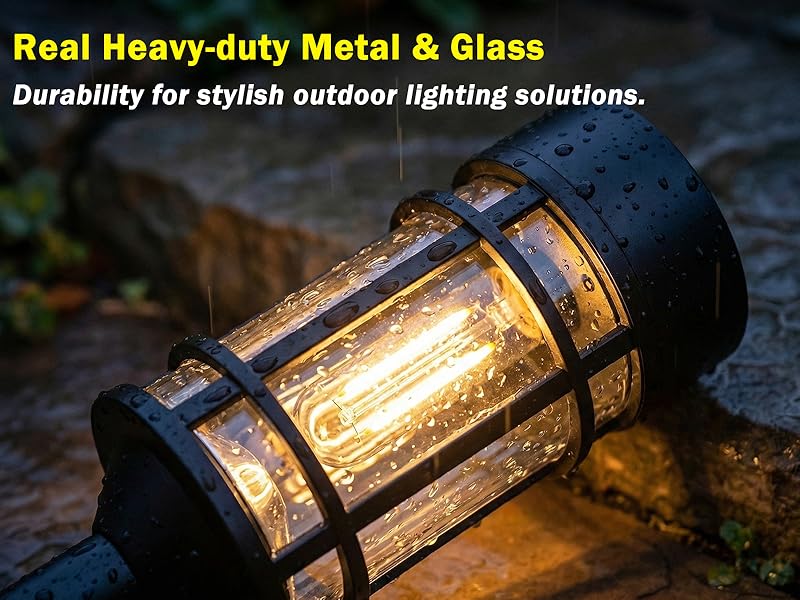Features a modern metallic texture and clear glass housing for stylish outdoor lighting solutions.