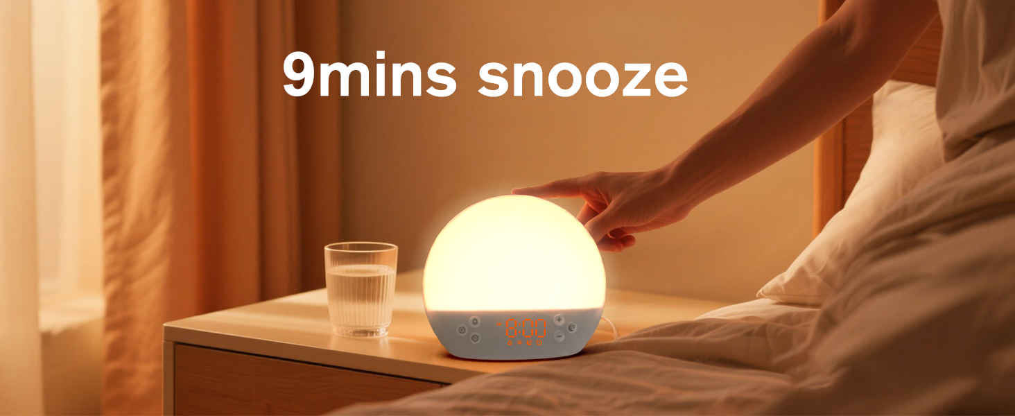 Text reads '9mins snooze'. Spherical white lamp glowing on bedside table in warm-lit bedroom setting with visible bedding.