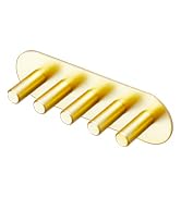 Set of golden or brass-colored metal hooks or hangers shown against a white background, arranged in a row to display their identical design.