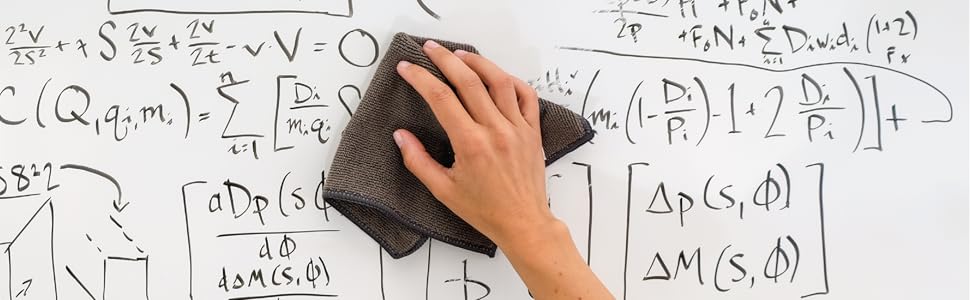 hand wiping whiteboard with microfiber towel