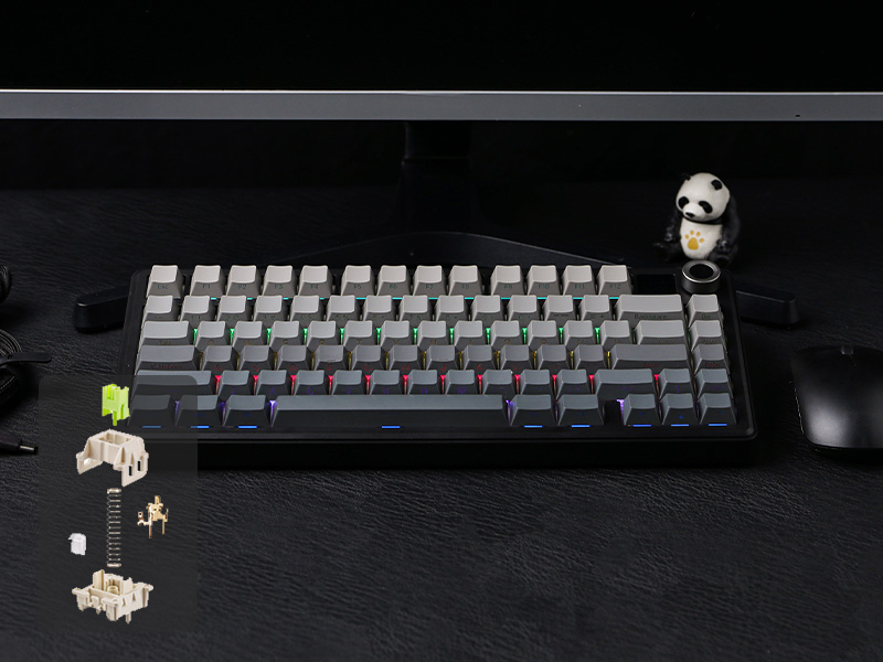 a black and silver keyboard with a black and silver mouse.