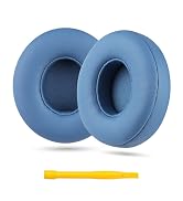 Two light blue, circular headphone ear cushions with soft leather-like exterior and fabric interior. A yellow plastic pry tool is shown below.
