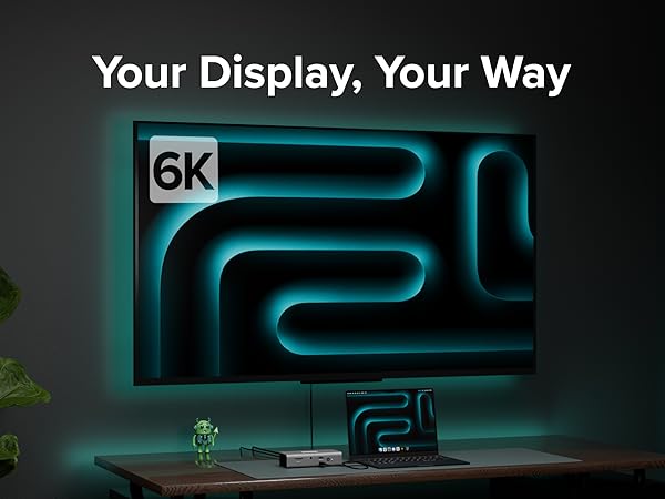 Thunderbolt 5 hub connected to laptop and monitor in a modern workspace with 6K display