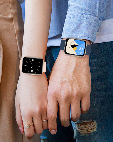 Two smartwatches shown side by side on wrists, displaying different watch faces - one black face and one with colorful graphics.