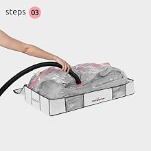 Vacuuming the comforter storage bag
