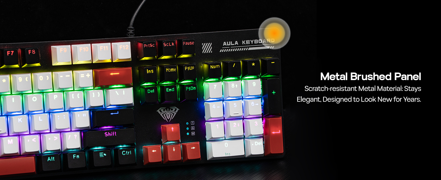 Text reads 'Metal Brushed Panel'. Close-up of mechanical gaming keyboard with RGB backlit keys, showing metallic brushed texture panel.