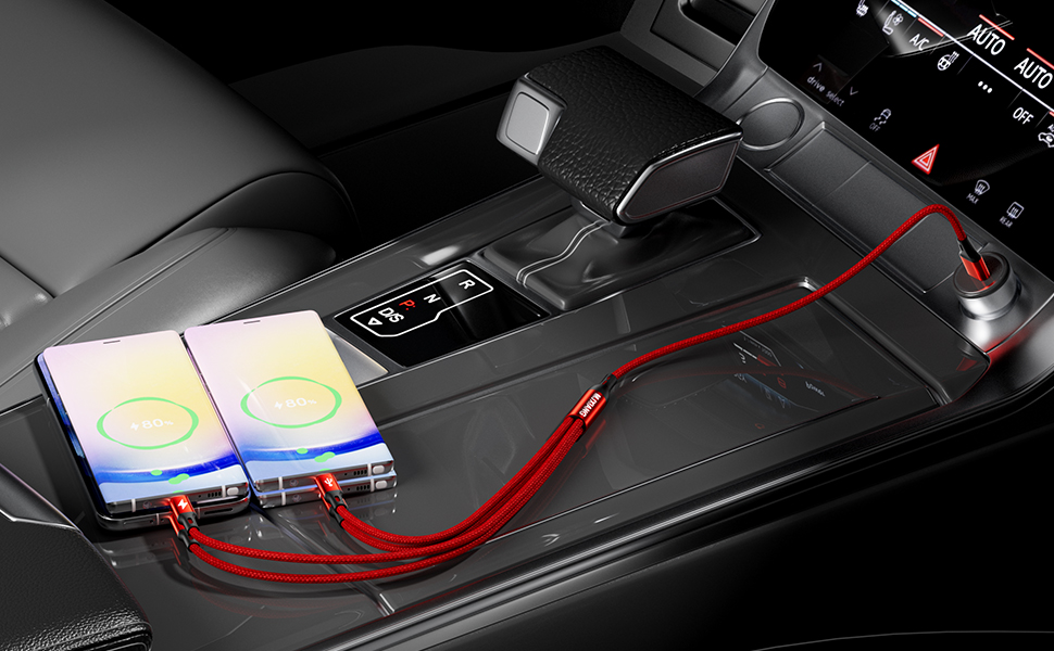 the car's dashboard is connected to a charging cable.