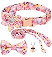 Pink floral pattern accessories collection including bow ties, rings, and decorative items in a coordinated design with multicolored flower motifs.