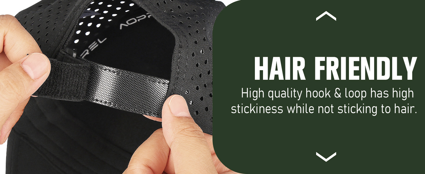 Close-up of a black hat with adjustable strap. Text highlights 'Hair Friendly' feature, noting high-quality hook and loop fastener that doesn't stick to hair.