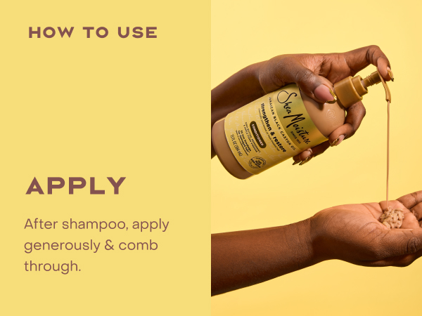Image of hands holding a conditioner bottle with product.