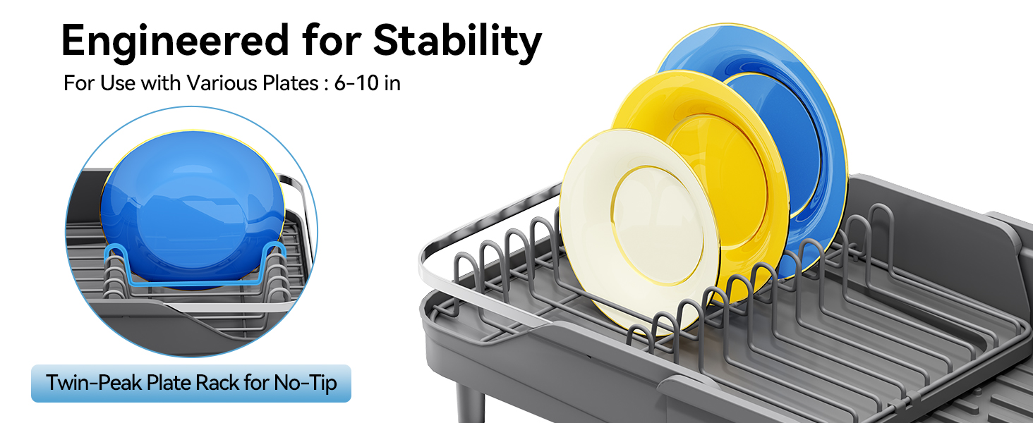 Text reads 'Engineered for Stability For Use with Various Pans 4-10 in' and 'Twin Peak Dish Rack for No-Tip'. Dish rack holding blue and yellow plates, showing stability engineering.