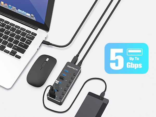 a laptop and a mouse connected to each other.