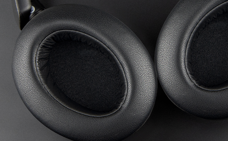 Close-up shots of black automotive interior surfaces, showing detailed views of texture and material.