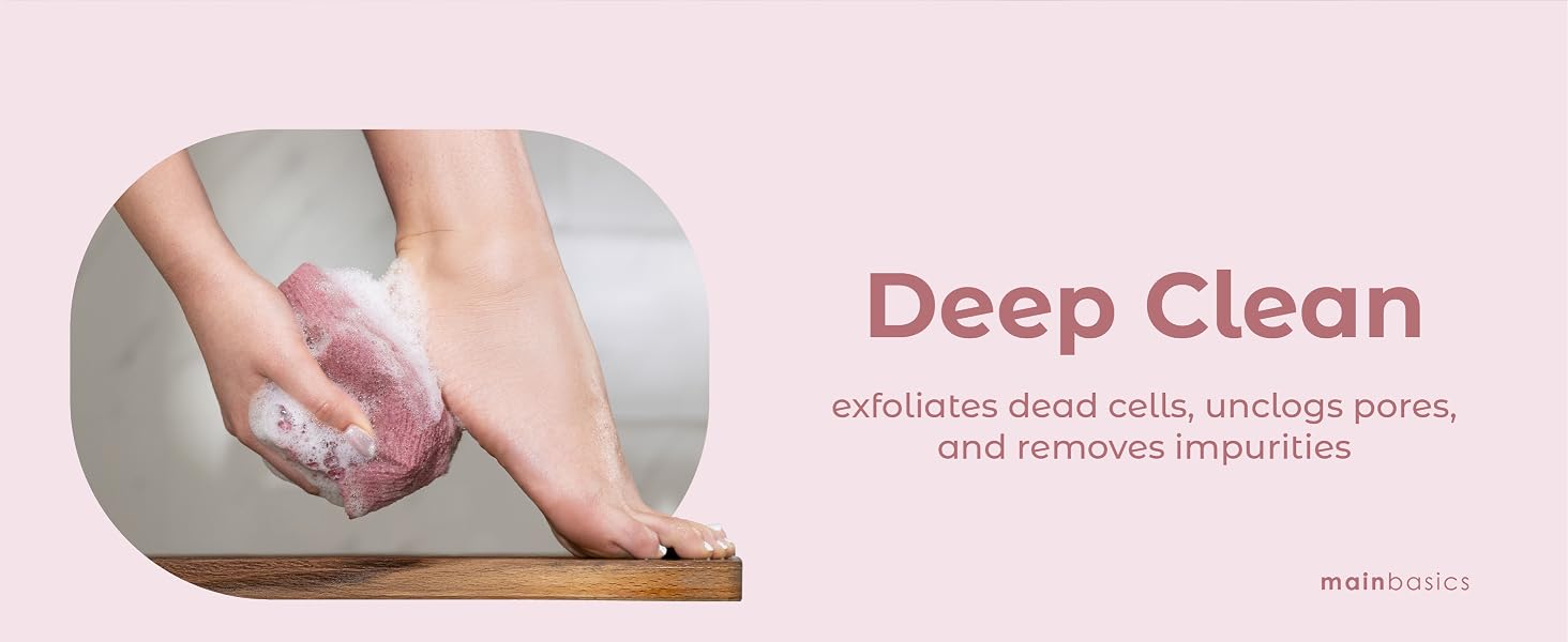 Feet being exfoliated with a body scrub towel, unclogging pores and removing impurities.