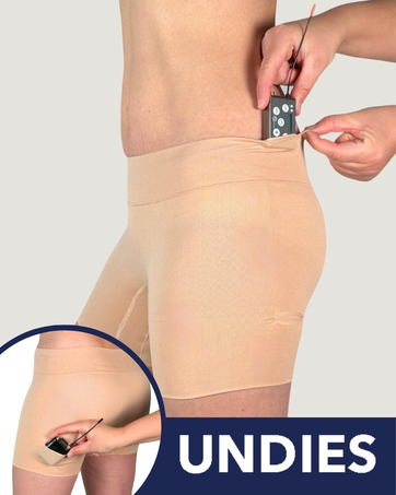Text reads 'UNDIES'. Close-up product demonstration of beige-colored undergarment with focus on seamless edge detail.