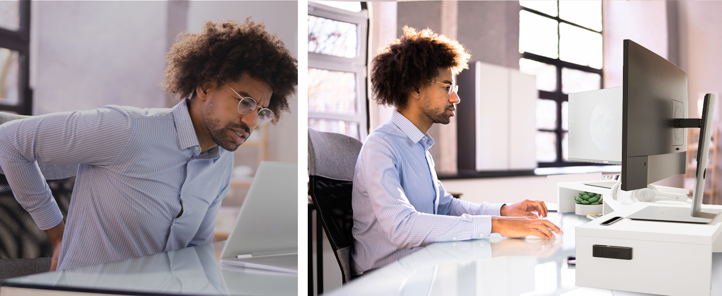 a man sitting at a desk with a laptop and a laptop.