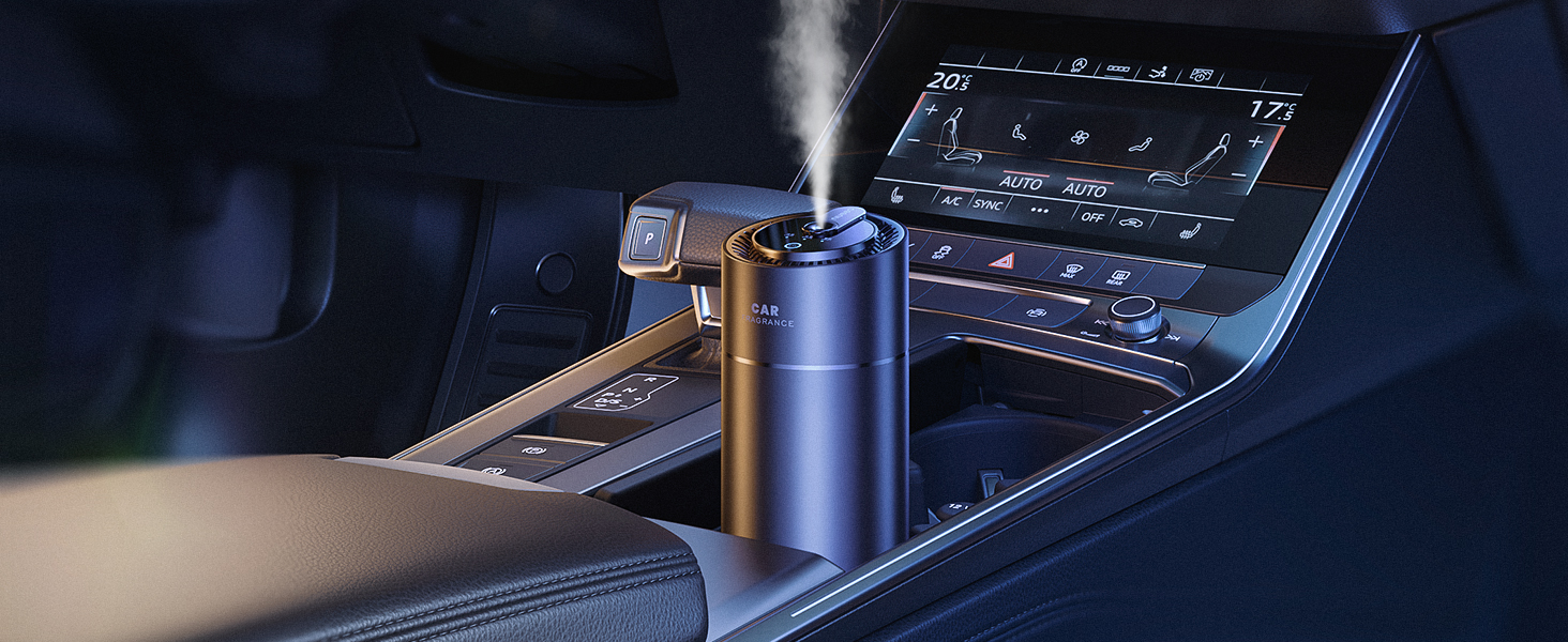 Blue metallic cylindrical object, possibly a drink container or accessory, placed in a car's center console cup holder next to digital displays.