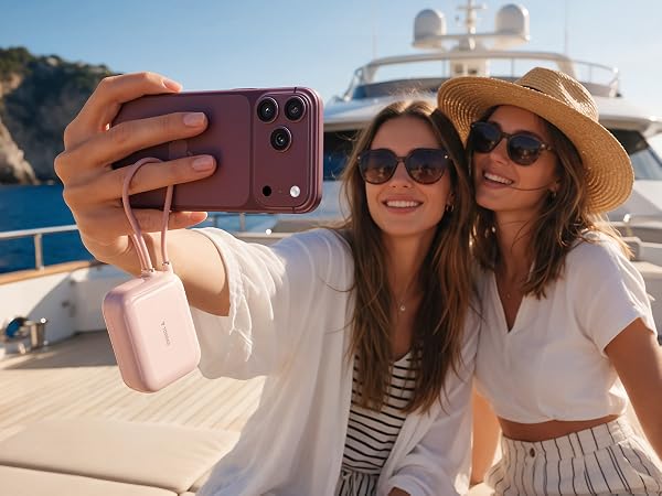 45W mini power bank with built-in cable for travel photo, fast charging iPhone 18 Pro Max on yacht