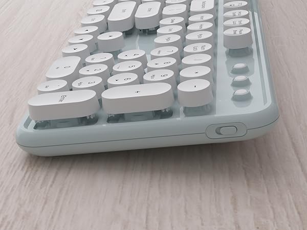 green white wireless keyboard and mouse
