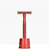 the red shaving brush is made from a red metal.