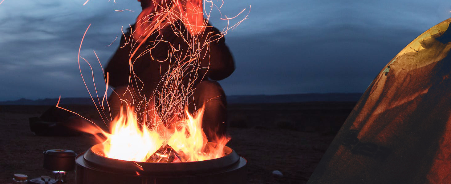 Blowing camping fire