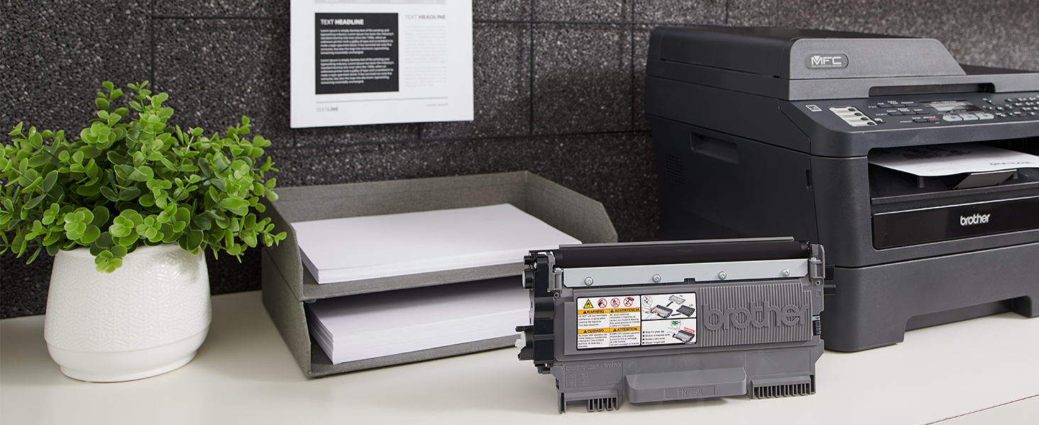 TN450 Toner Cartridge Next to Printer