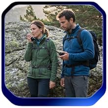 Hikers using radios outdoors, emphasizing pre-trip programming with Wouxun programming cable