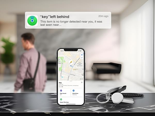 Modern office setting showing mobile devices and workspace items on a desk with natural lighting.