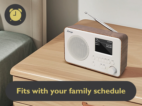 Text reads 'Fits with your family schedule'. Shows white digital radio or alarm device on wooden surface in different angles and settings.