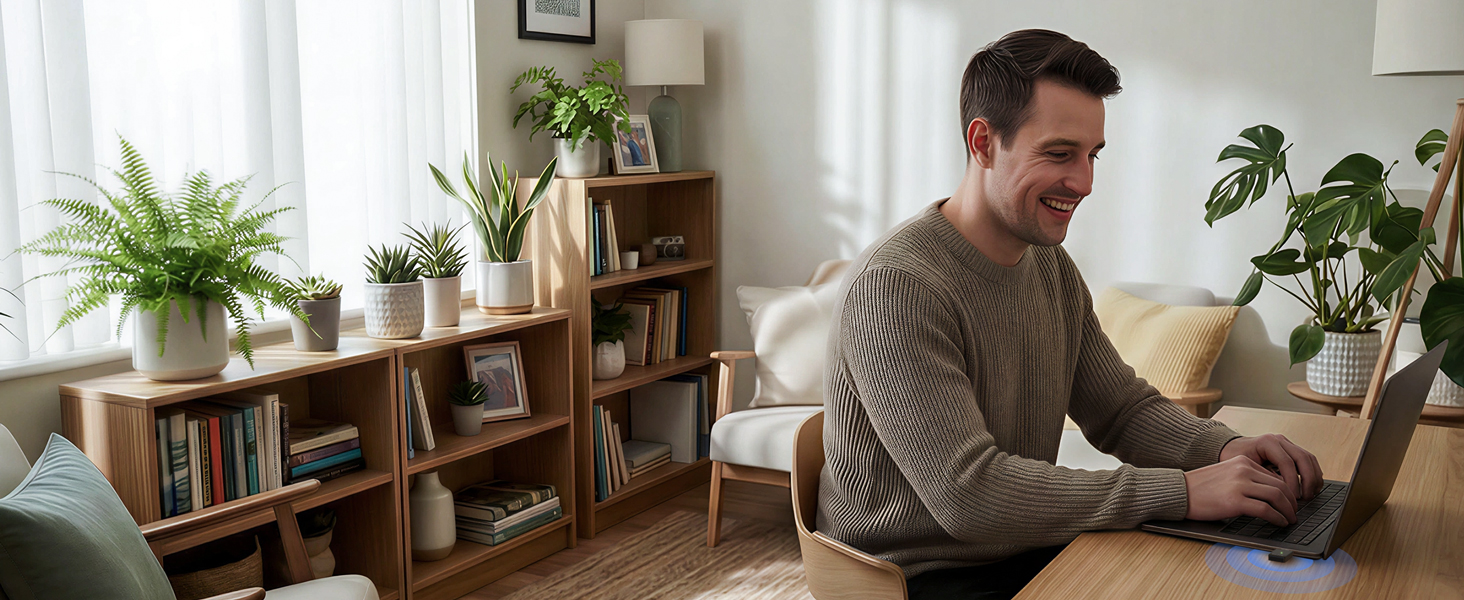 A Man Is Using a Laptop and Enjoying Fast Internet Access with the Linux USB WiFi Adapter