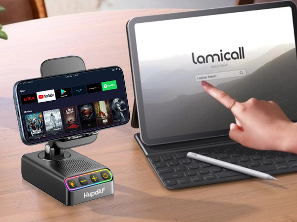 Text reads 'lamicall'. Series of images showing black phone charging stand/holder in different positions with phone displaying content. Shows desk setup with keyboard in background.