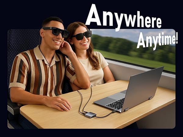 Text reads 'Anywhere' and 'Anytime!'. Sequence showing people using laptop computer on what appears to be a portable desk or workstation.