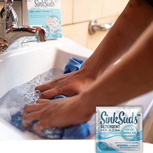 travel laundry detergent packets to wash clothes in hotel while traveling family washing clothes