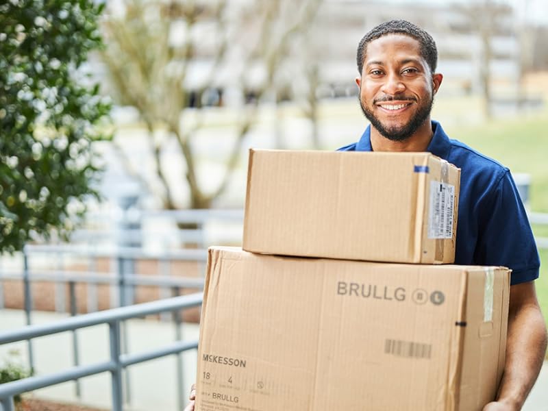 delivery man delivering hospital supplies