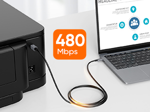 a laptop and a laptop on a desk