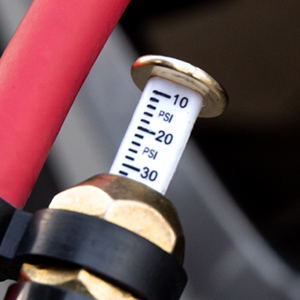 tire pressure gauge with inflator