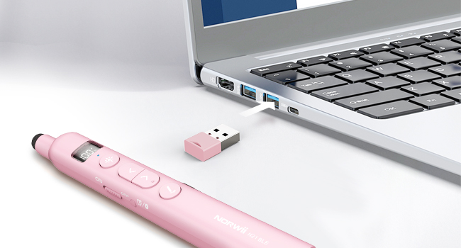 Close-up views of laptop keyboard and ports, showing USB connections and peripheral device attachments in professional setting.