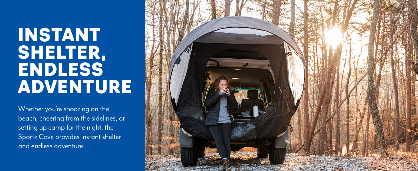 Napier Sportz Cove SUV tent with large awning and camper sipping coffee inside vehicle shelter