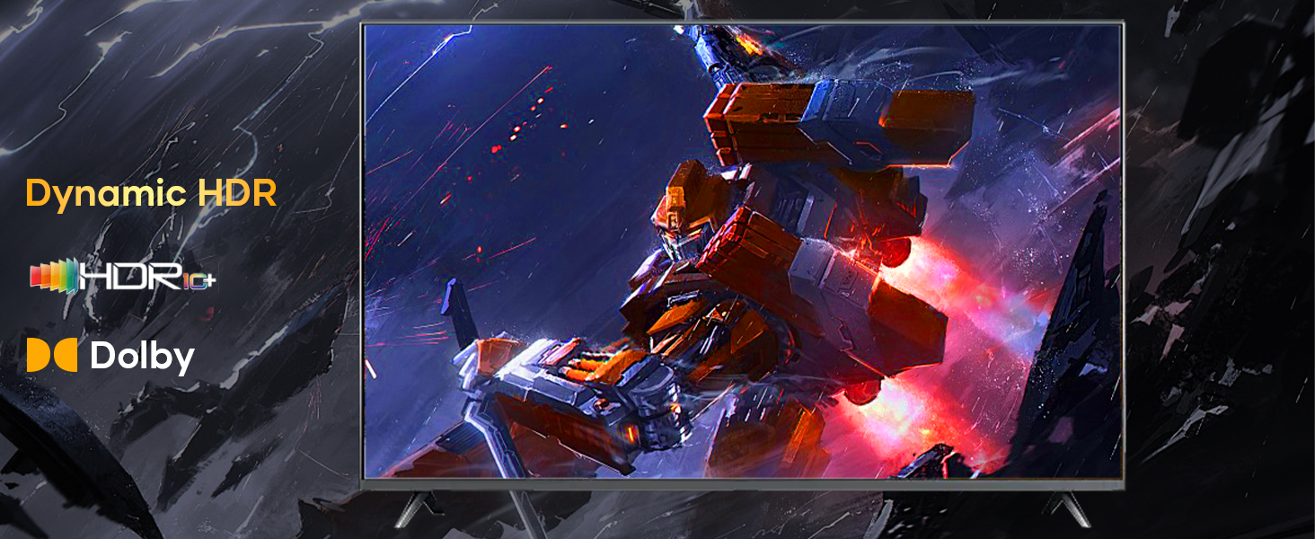 Television displaying a colorful sci-fi battle scene with robots. Features Dynamic HDR and Dolby technology logos. The TV has thin bezels and shows vibrant colors against a dark background.