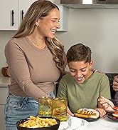 Mom and son enjoying hot dog and bun with the Kusini Hot Dog and food steamer