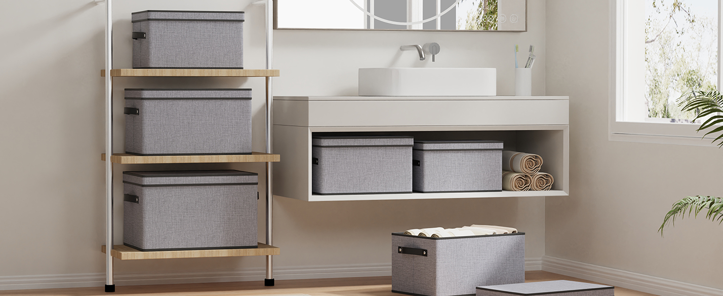 Modern kitchen storage solution showing pull-out cabinet organizers with gray storage bins installed in wooden cabinetry.