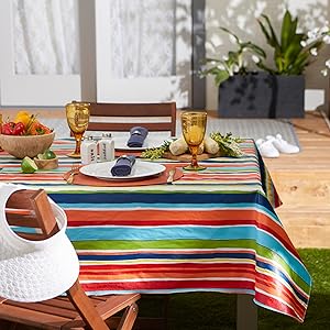 DII Summer Stripe vinyl tablecloth with garden view