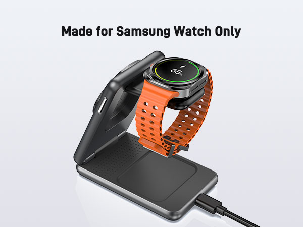 Samsung Watch charging accessory with black and orange components, shown from multiple angles with USB connection.