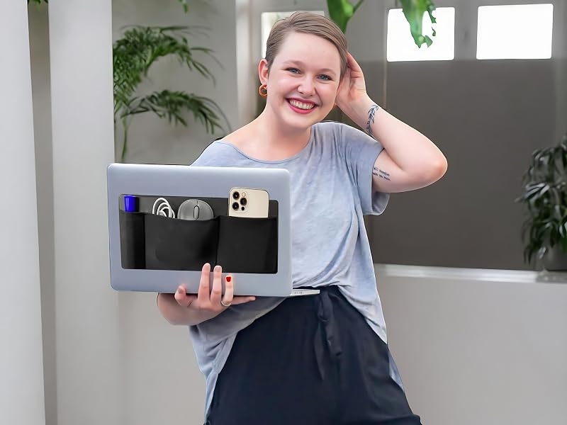 Smiling woman holding MacBook with 3-Pocket Stick-On Organizer for cables, mouse, phone &amp;amp;amp;amp
