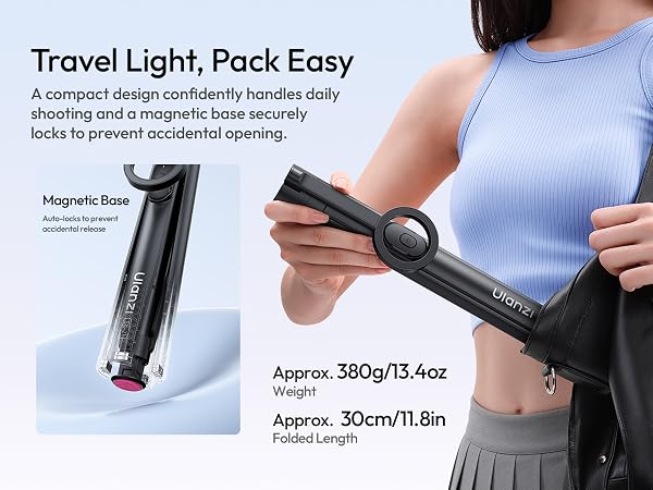 Text reads 'Travel Light, Pack Easy'. Product demonstration of magnetic clothing clip system with measurements shown as 'Approx. 30cm/11.8in' and usage instructions.