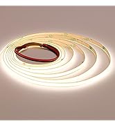 Series of curved, concentric circular light installations on a beige ceiling or wall, creating a modern architectural lighting design with warm illumination.