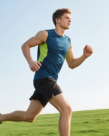 Series of images showing person running outdoors against sky backdrop, demonstrating athletic movement across grassy terrain in athletic wear.